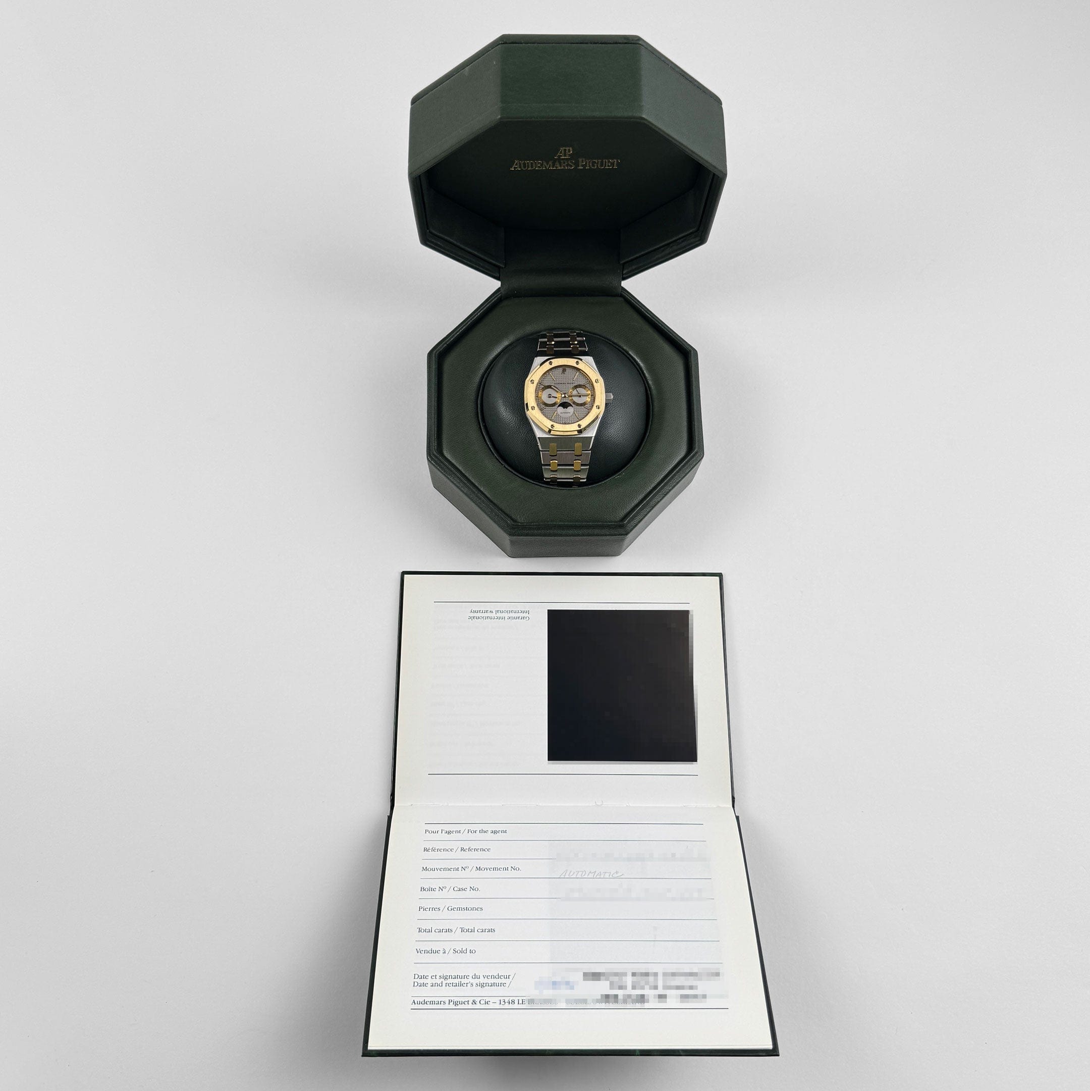 Audemars Piguet Royal Oak 25594SA.OO.0789SA.01 Day-Date Moonphase Yellow Gold Stainless Steel Silver Dial (1994)