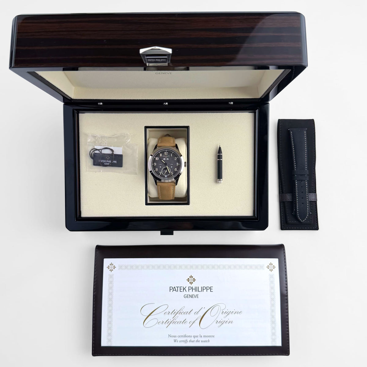 Patek Philippe Complications 5326G-001 Annual Calendar Travel Time White Gold Grey Dial (2026)