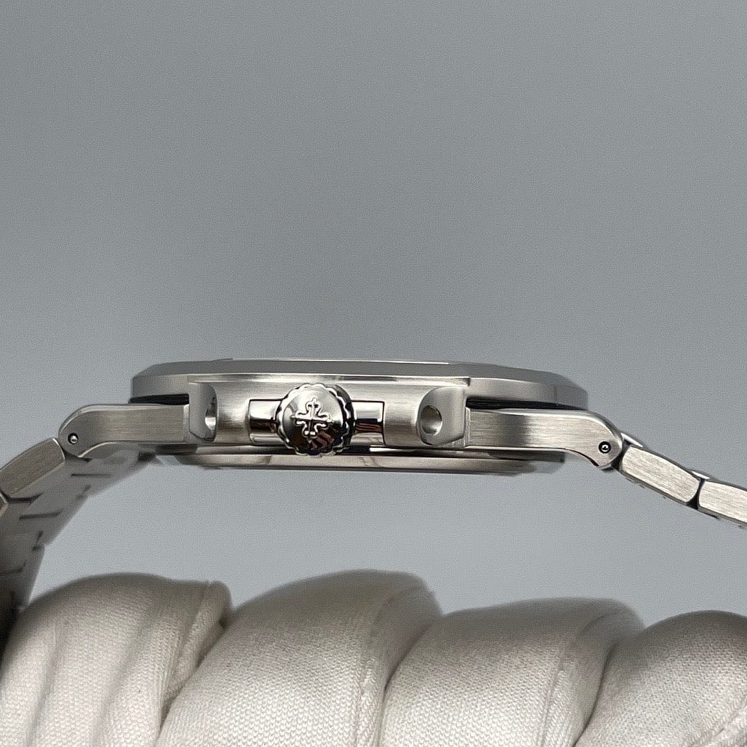 Luxury Watch Patek Philippe Nautilus Steel Olive Green Dial Baguette Diamond Bezel 5711/1300A Wrist Aficionado