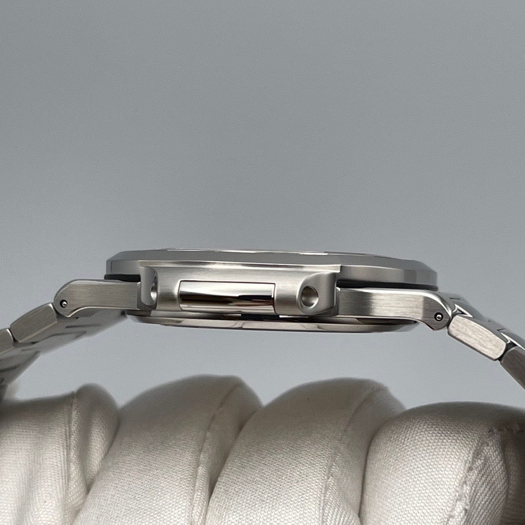 Luxury Watch Patek Philippe Nautilus Steel Olive Green Dial Baguette Diamond Bezel 5711/1300A Wrist Aficionado