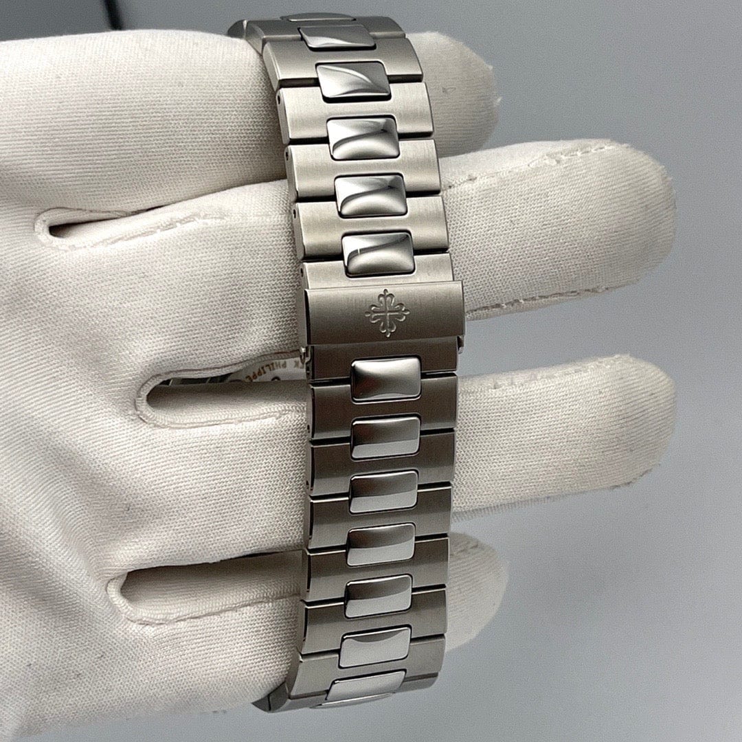 Luxury Watch Patek Philippe Nautilus Steel Olive Green Dial Baguette Diamond Bezel 5711/1300A Wrist Aficionado