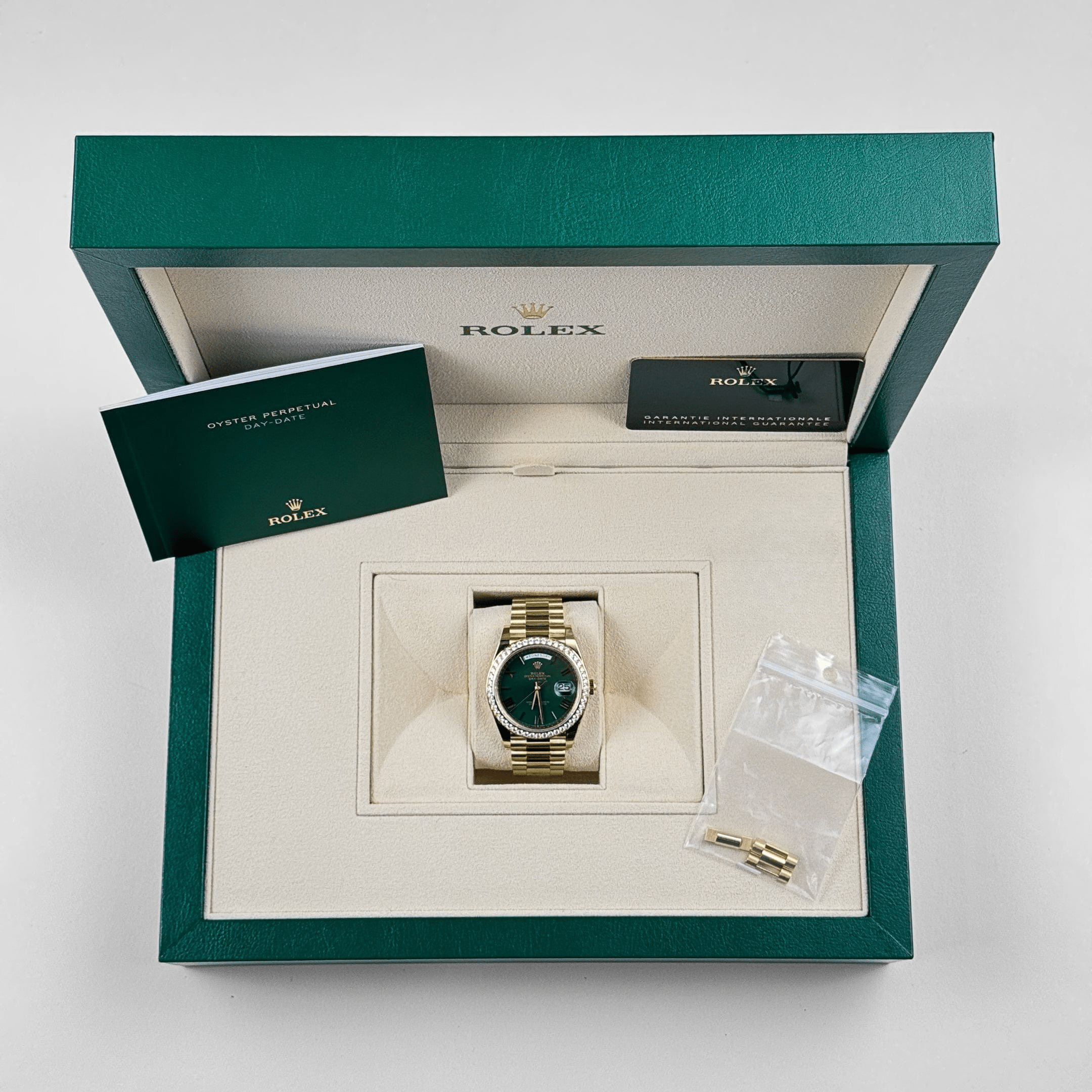 Rolex Day-Date 228348RBR Yellow Gold Green Roman Numeral Dial Diamond Bezel (2024)