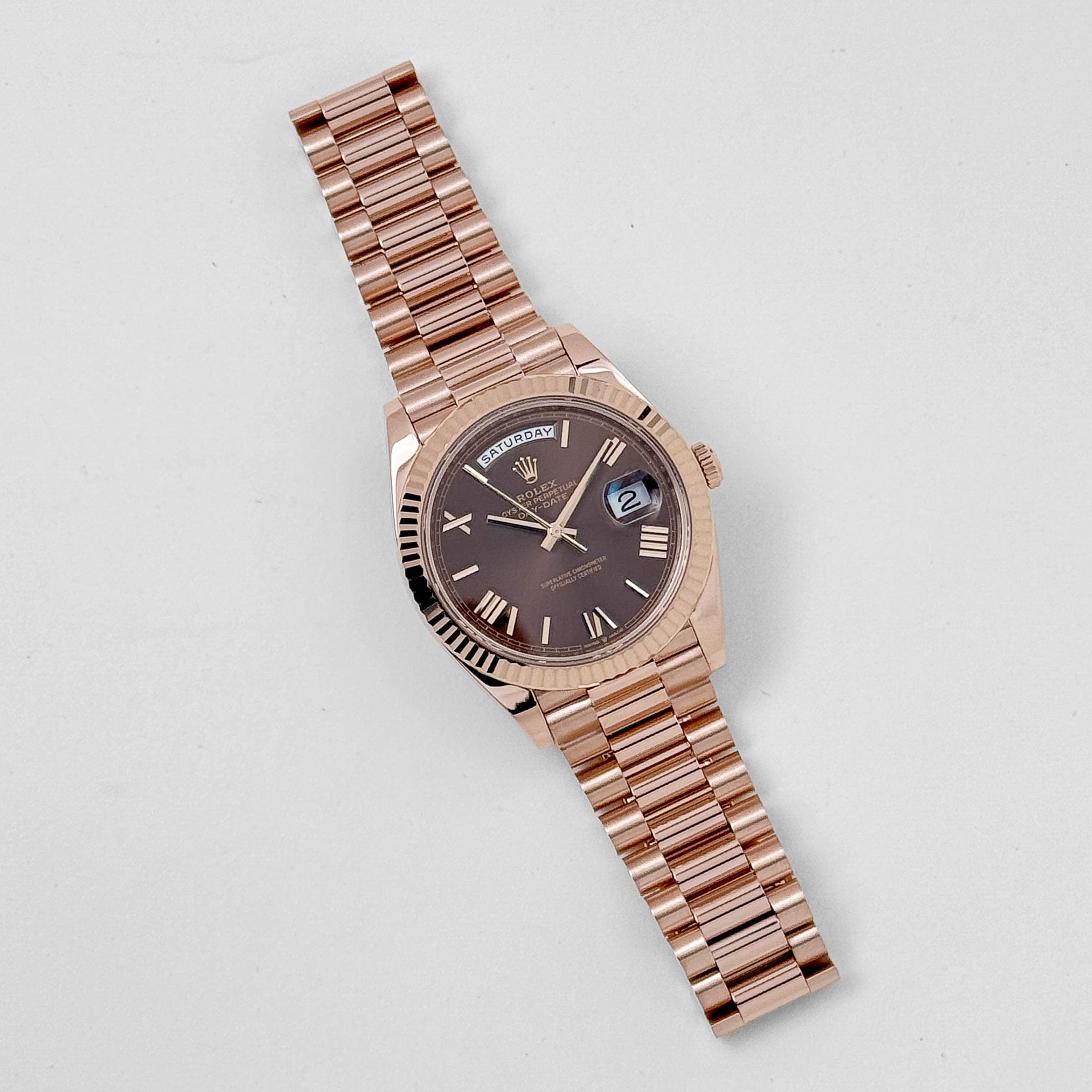 Rolex Day-Date 40 228235 Rose Gold Chocolate Roman Dial (2024)