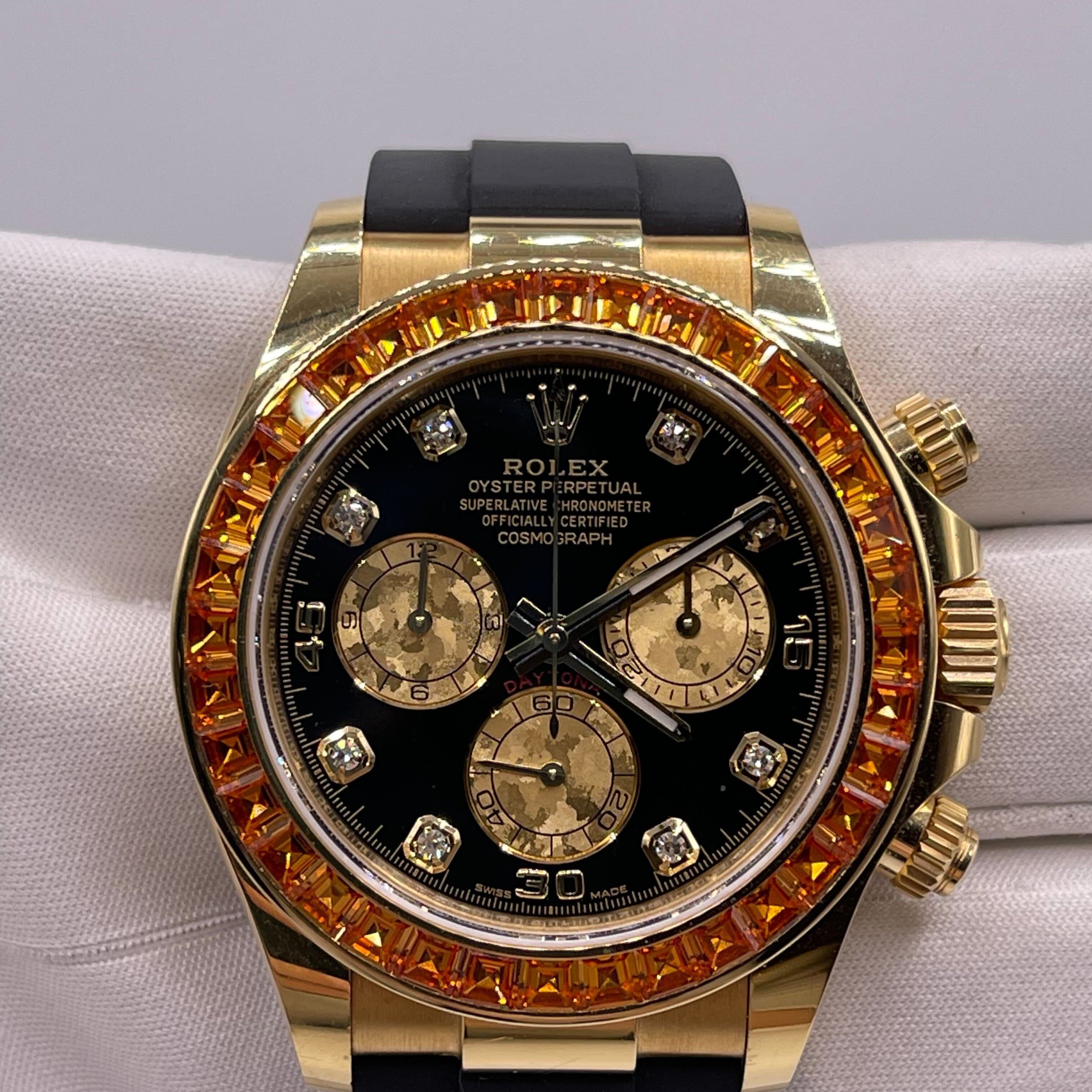 Luxury Watch Rolex Daytona Yellow Gold Orange Sapphire Bezel Black Diamond Dial 116588SACO Wrist Aficionado