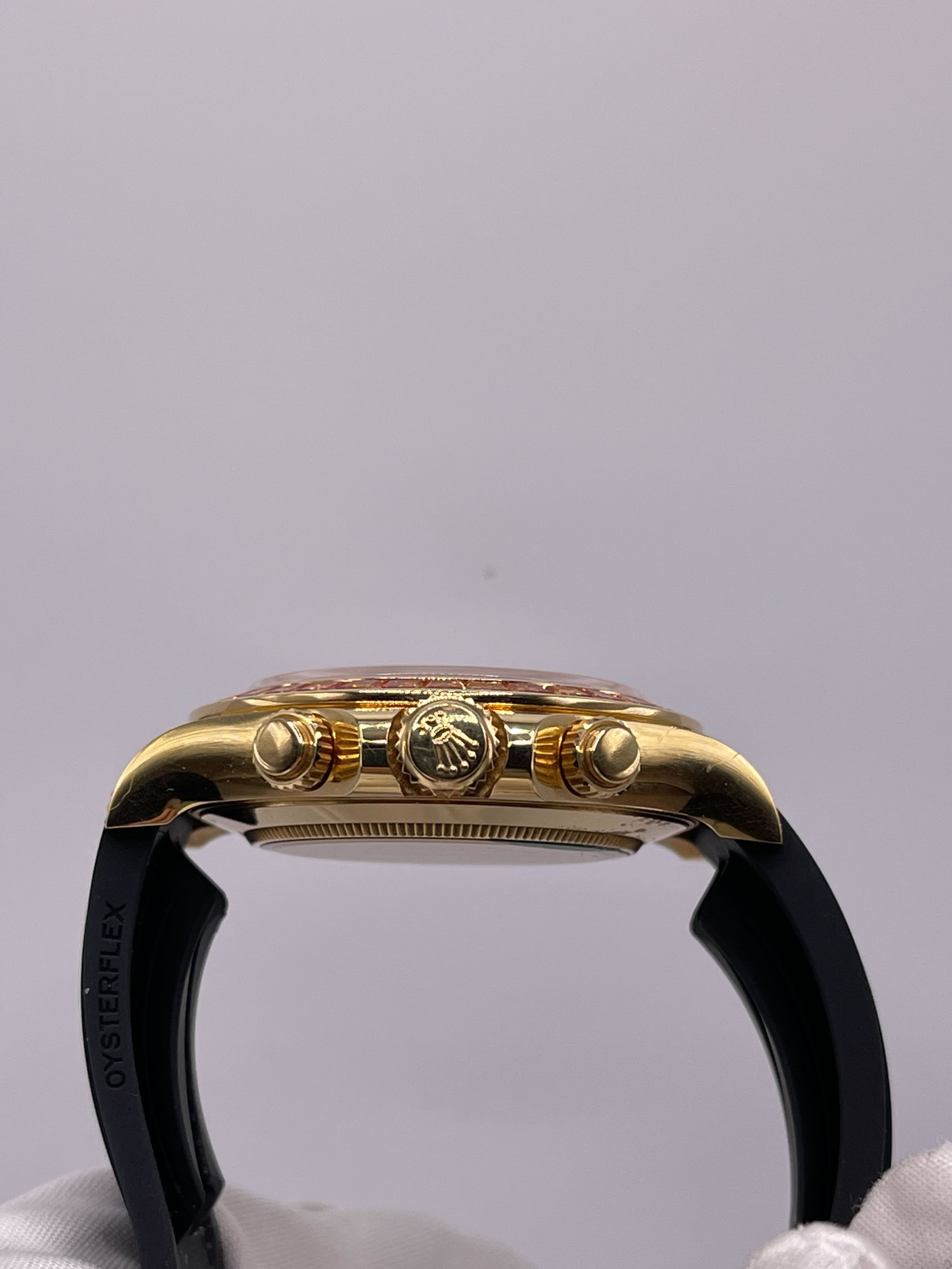 Luxury Watch Rolex Daytona Yellow Gold Orange Sapphire Bezel Black Diamond Dial 116588SACO Wrist Aficionado