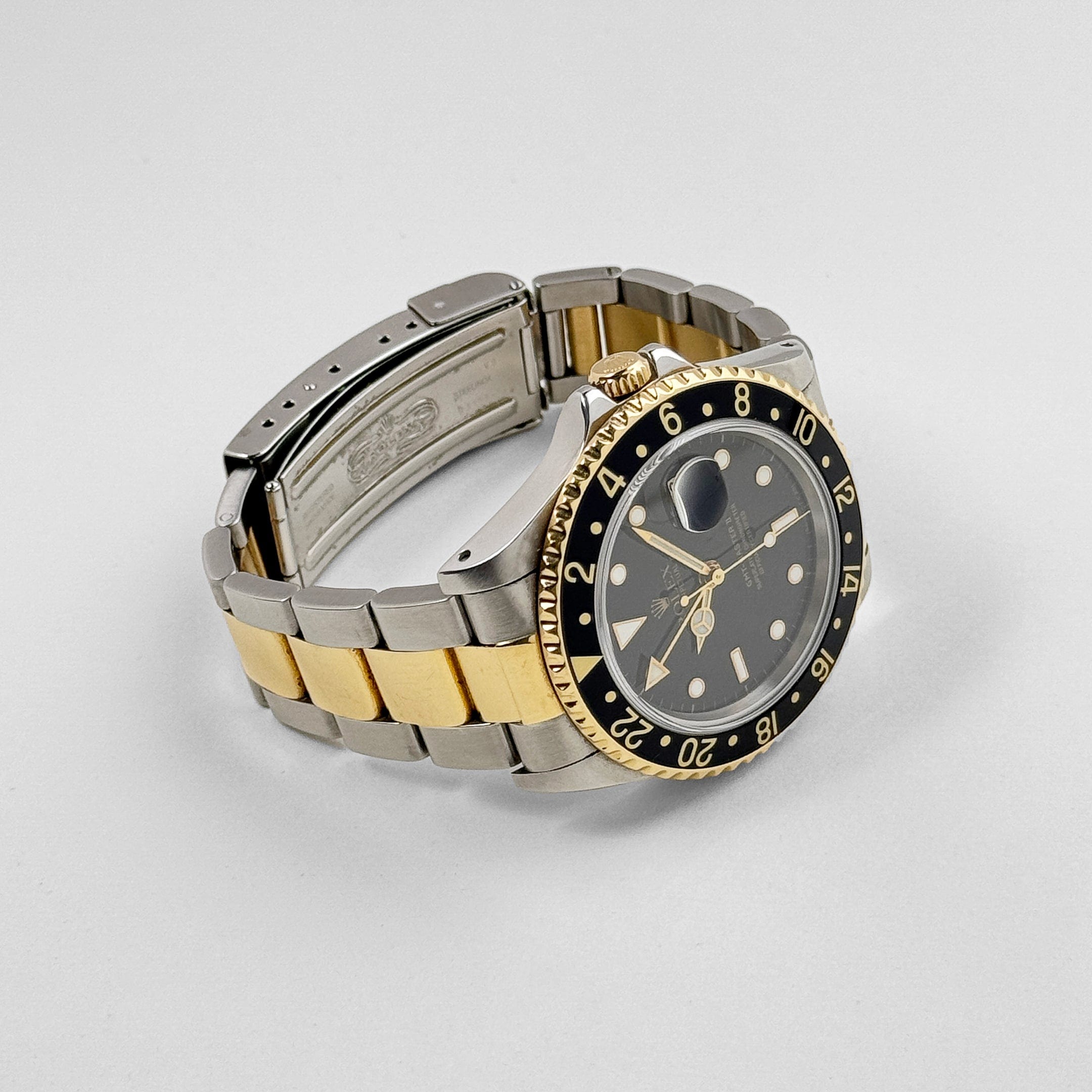 Rolex GMT-Master II 16713 Stainless Steel Yellow Gold Black Dial (1997)