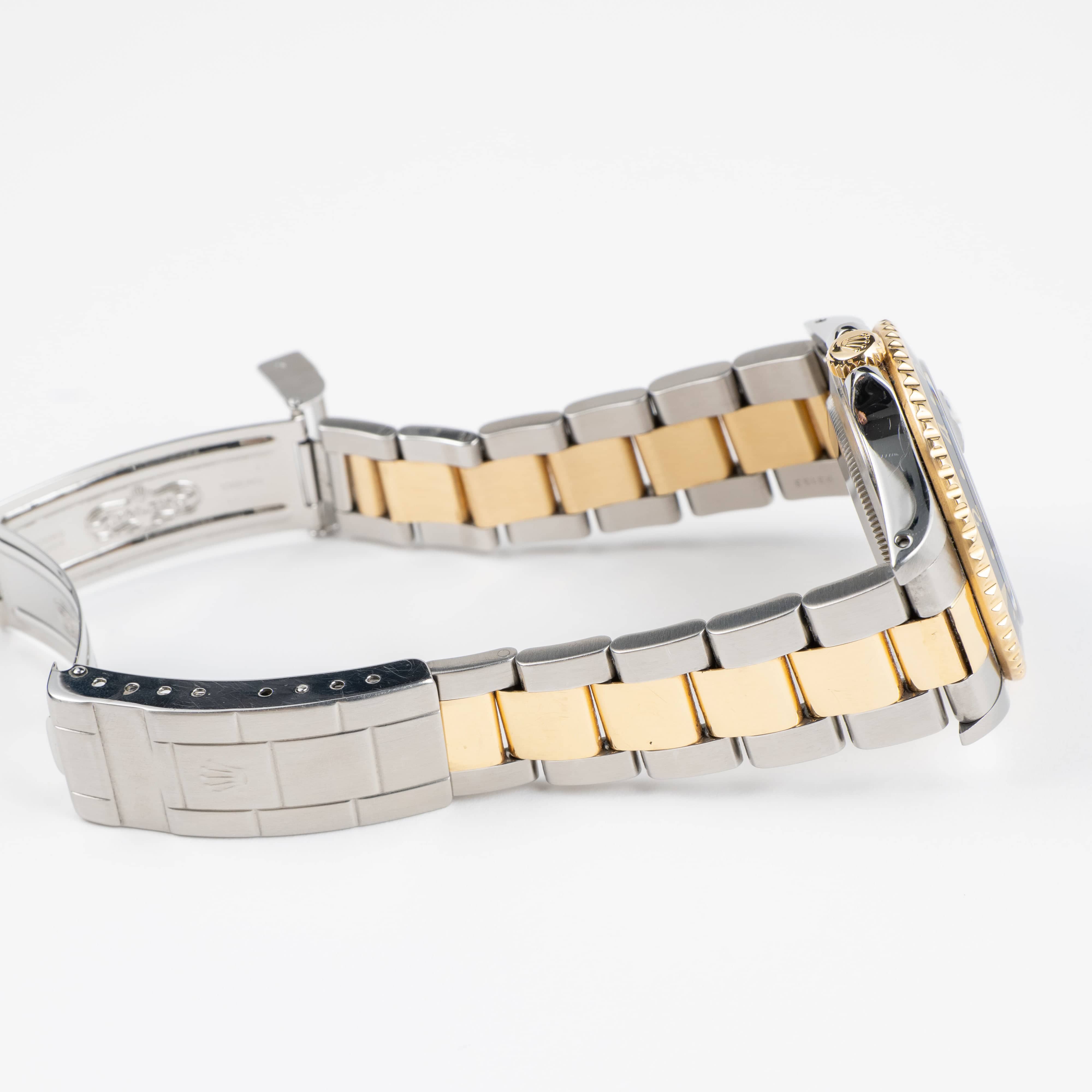 Rolex GMT-Master II 16713 Stainless Steel Yellow Gold Black Dial (1997)