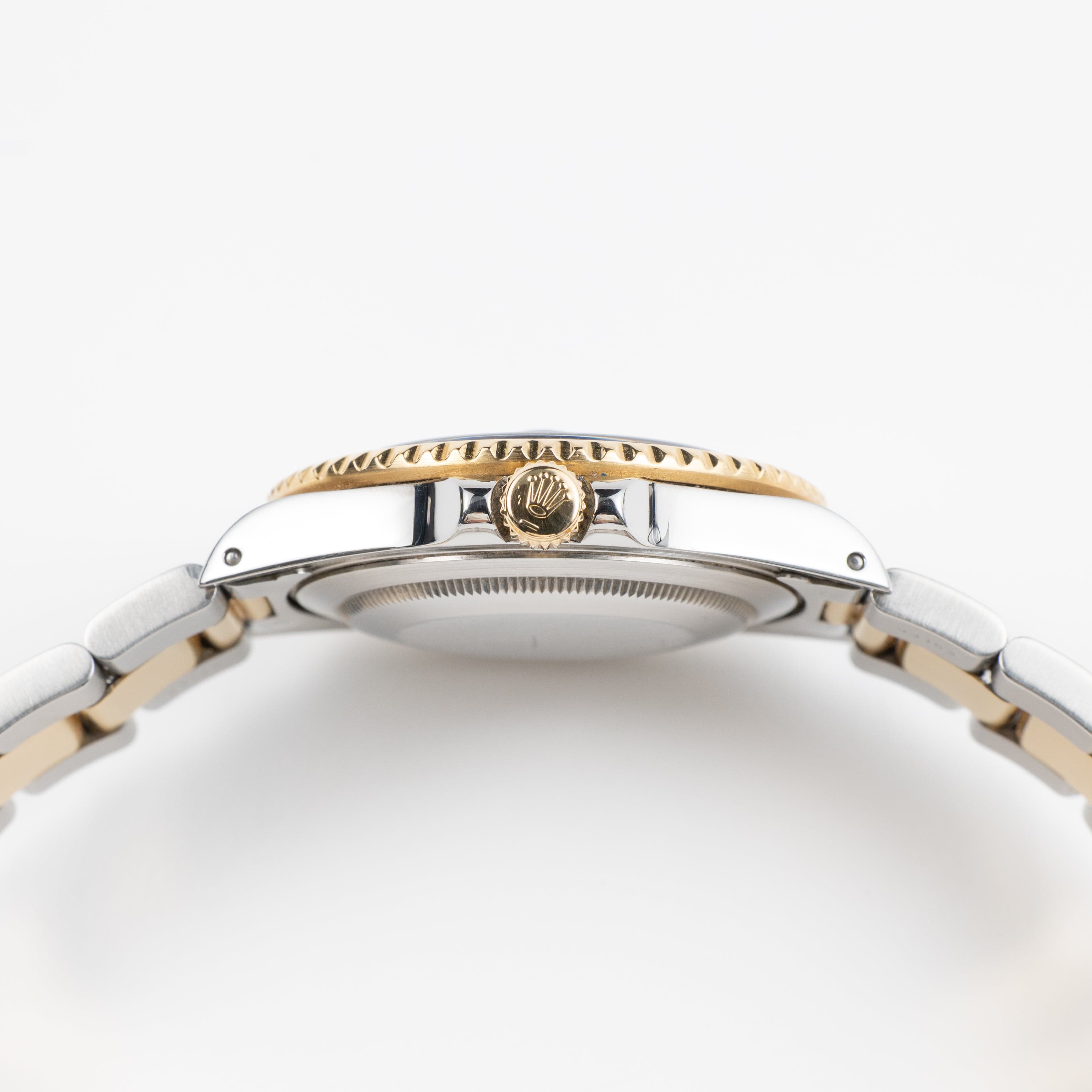 Rolex GMT-Master II 16713 Stainless Steel Yellow Gold Black Dial (1997)