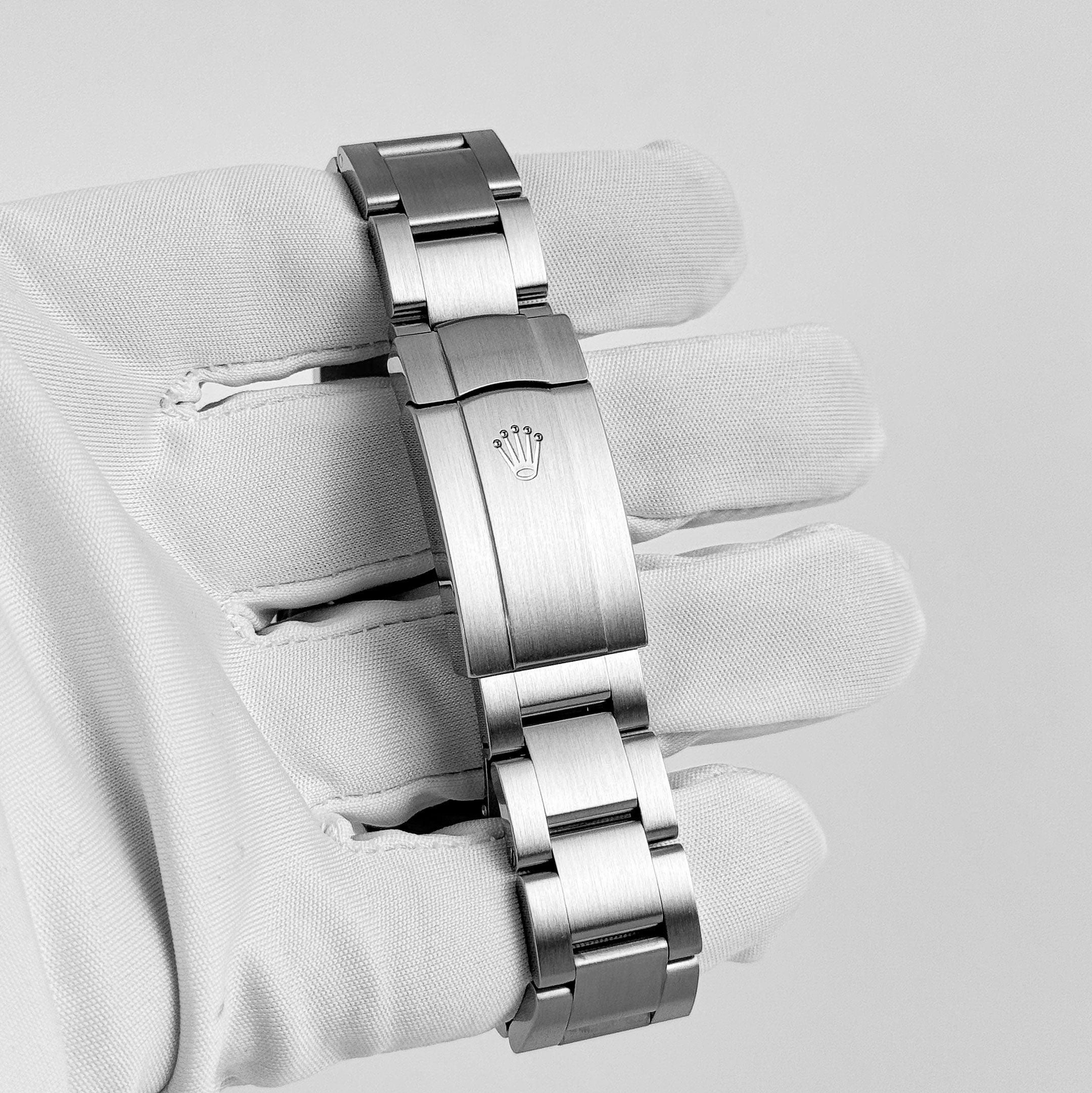 Rolex Oyster Perpetual 41 124300 Stainless Steel Red Dial