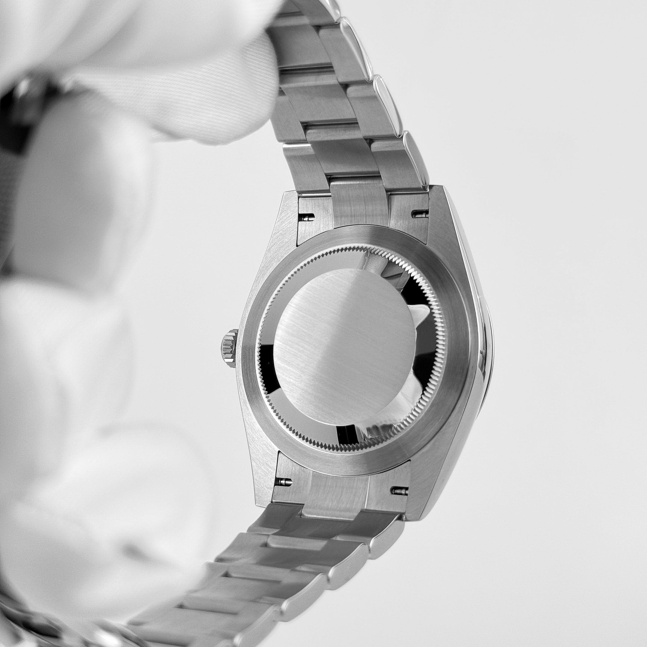 Rolex Oyster Perpetual 41 124300 Stainless Steel Red Dial