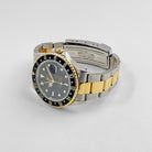 Rolex GMT-Master II 16713 Stainless Steel Yellow Gold Black Dial (1997) - Wrist Aficionado
