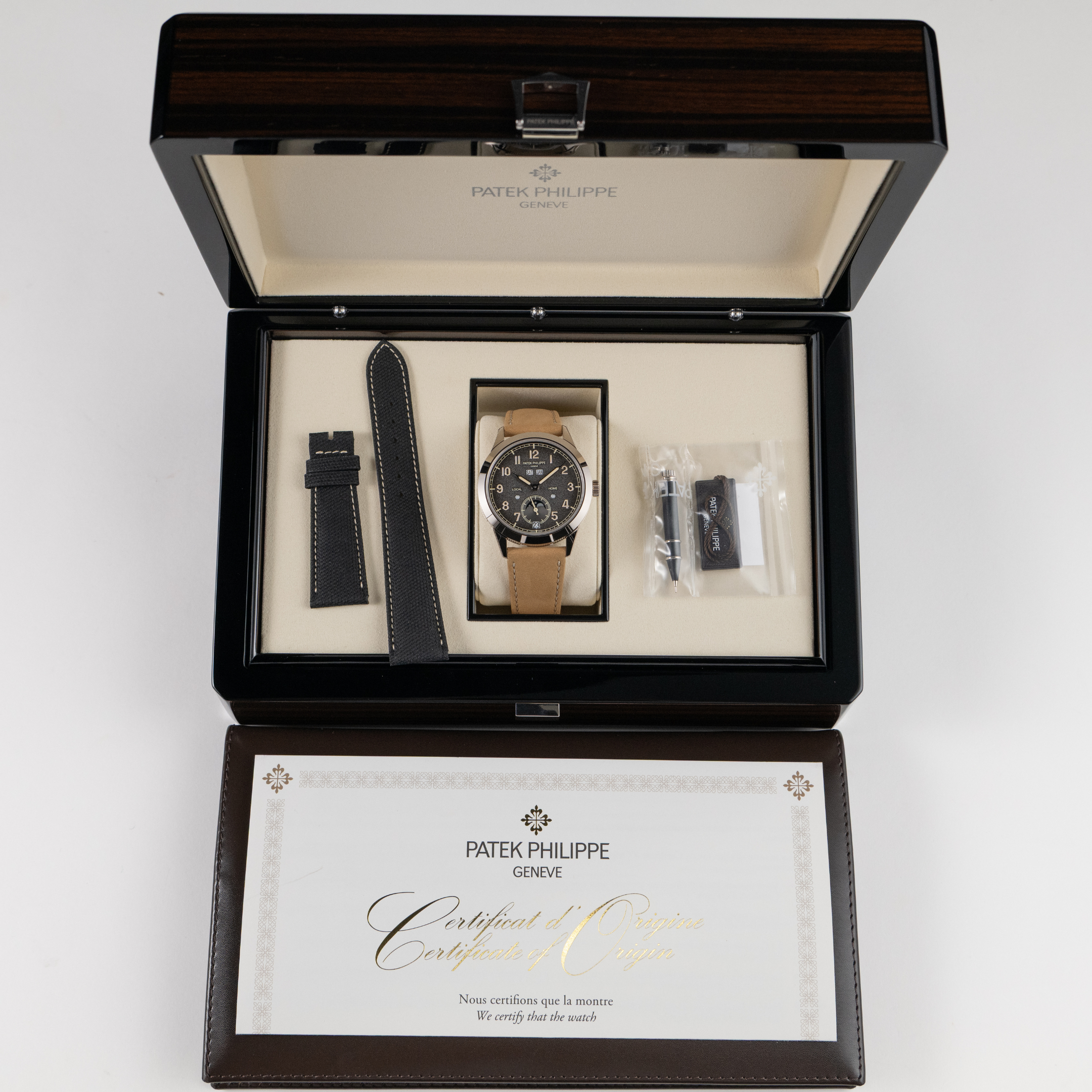 Patek Philippe Complications 5326G-001 Annual Calendar Travel Time White Gold Grey Dial (2026)