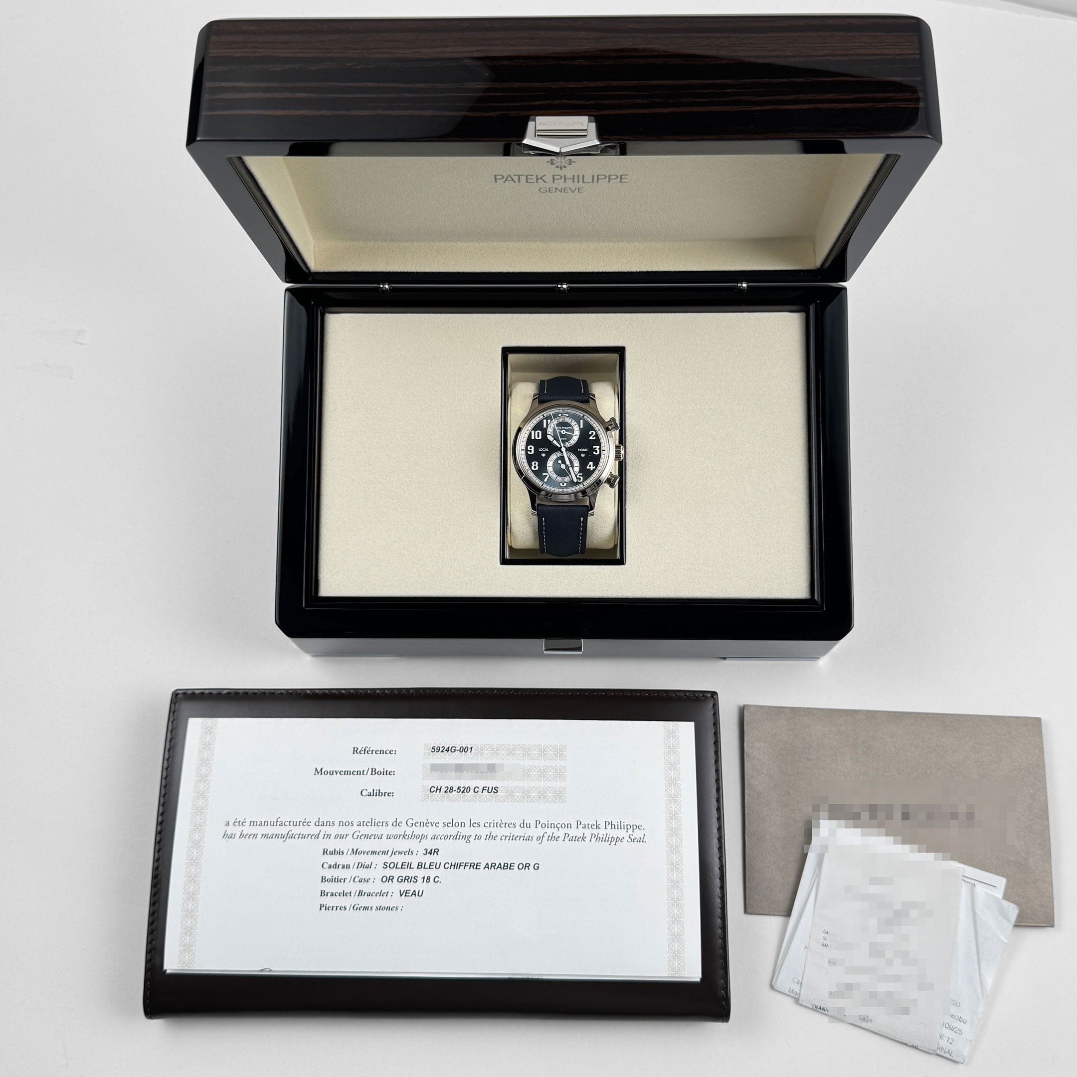 Patek Philippe Complications 5924G-001 Calatrava 'Pilot' Travel Time Flyback Chronograph White Gold Blue-Gray Dial (2025)