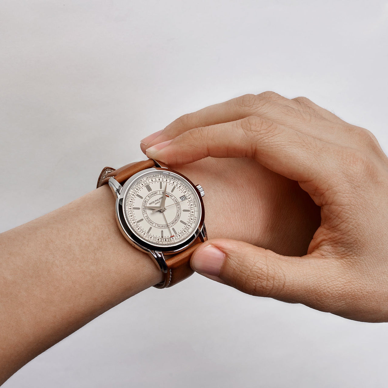 Luxury Watch Patek Philippe Calatrava Weekly Calendar Silvery Opaline Dial 5212A-001 Wrist Aficionado
