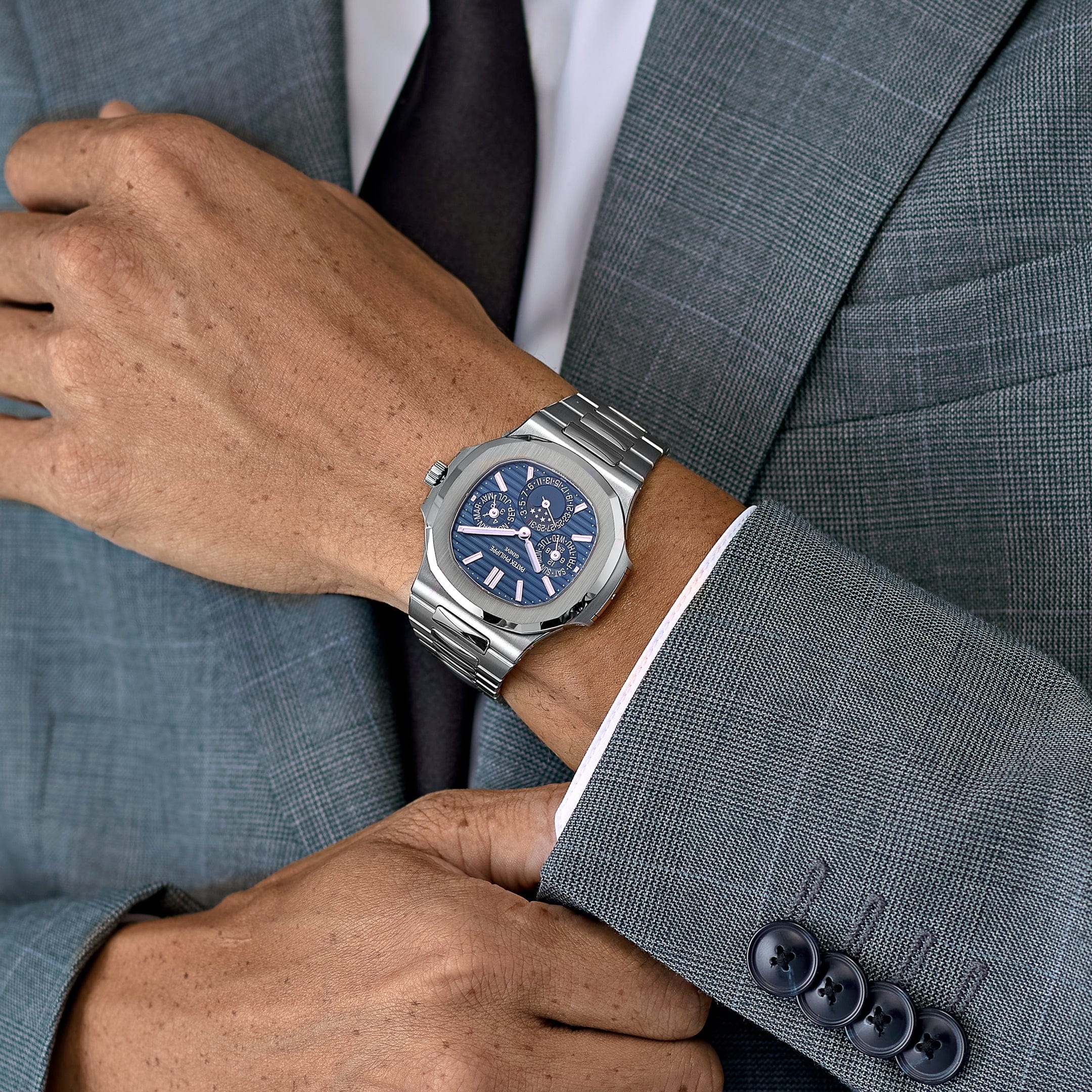 Patek Philippe Nautilus 5740/1G-001 Perpetual Calendar Moon Phases White Gold (2019)