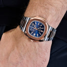 Luxury Watch Patek Philippe Nautilus Chronograph Steel & Rose Gold Blue Dial 5980/1AR-001 Wrist Aficionado