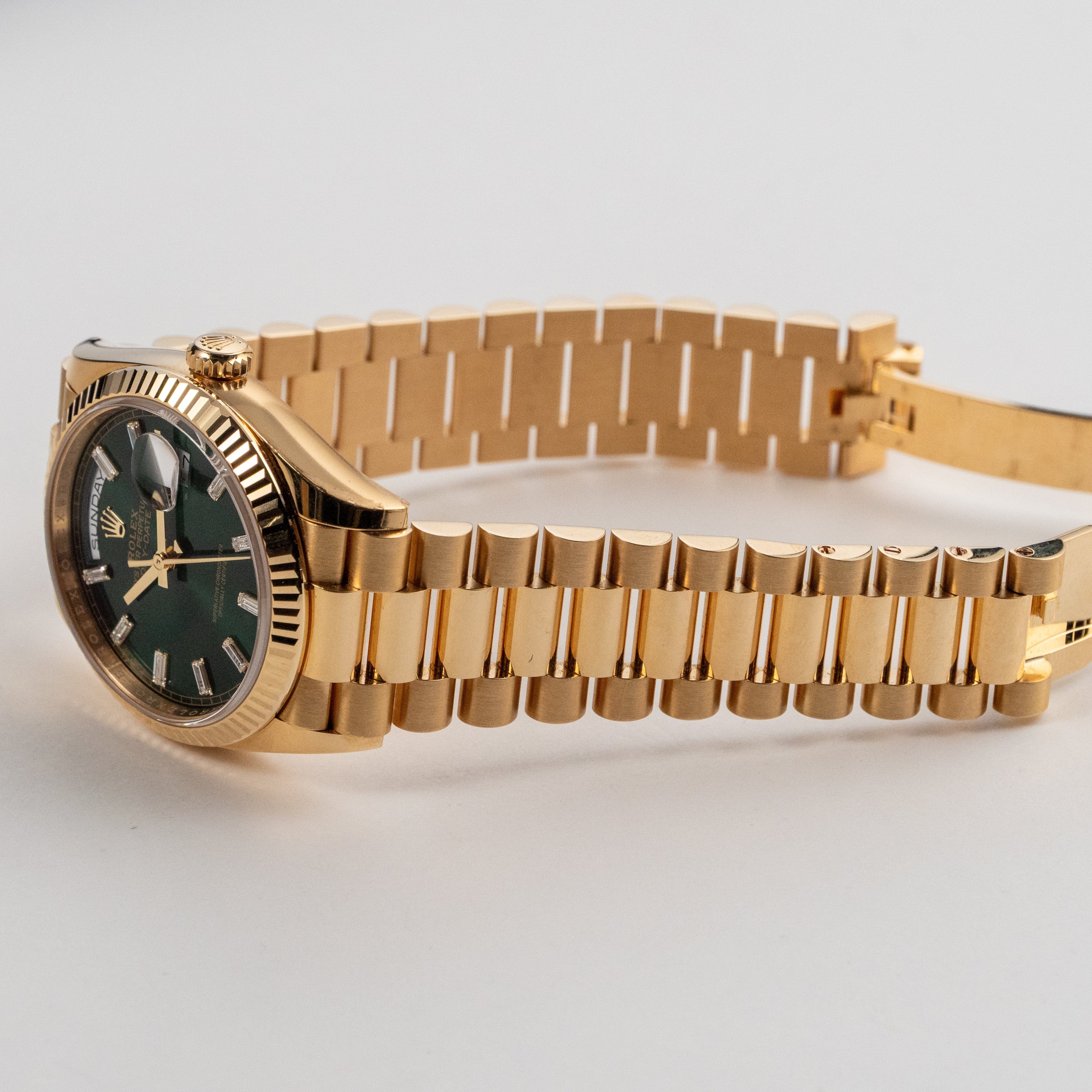 Rolex Day-Date 36 128238 Yellow Gold Green Diamond Baguette Dial (2025)