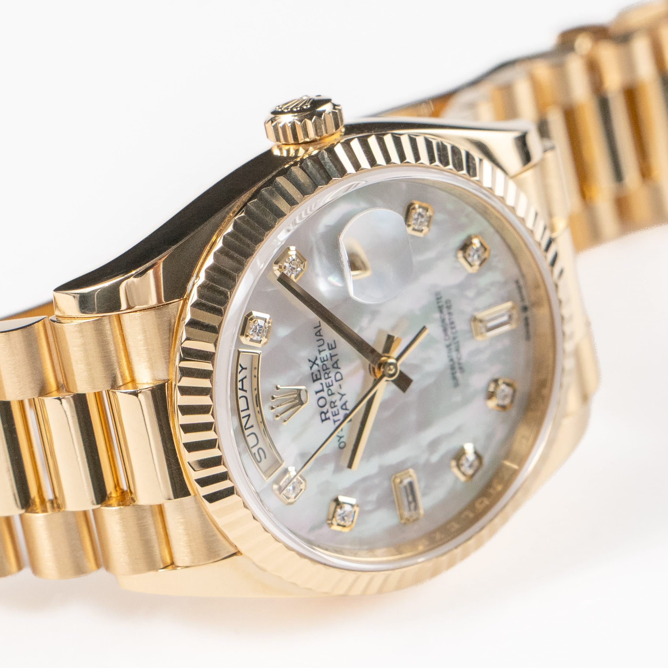 Rolex Day-Date 36 128238 Yellow Gold White Mother of Pearl Diamond Dial (2026)