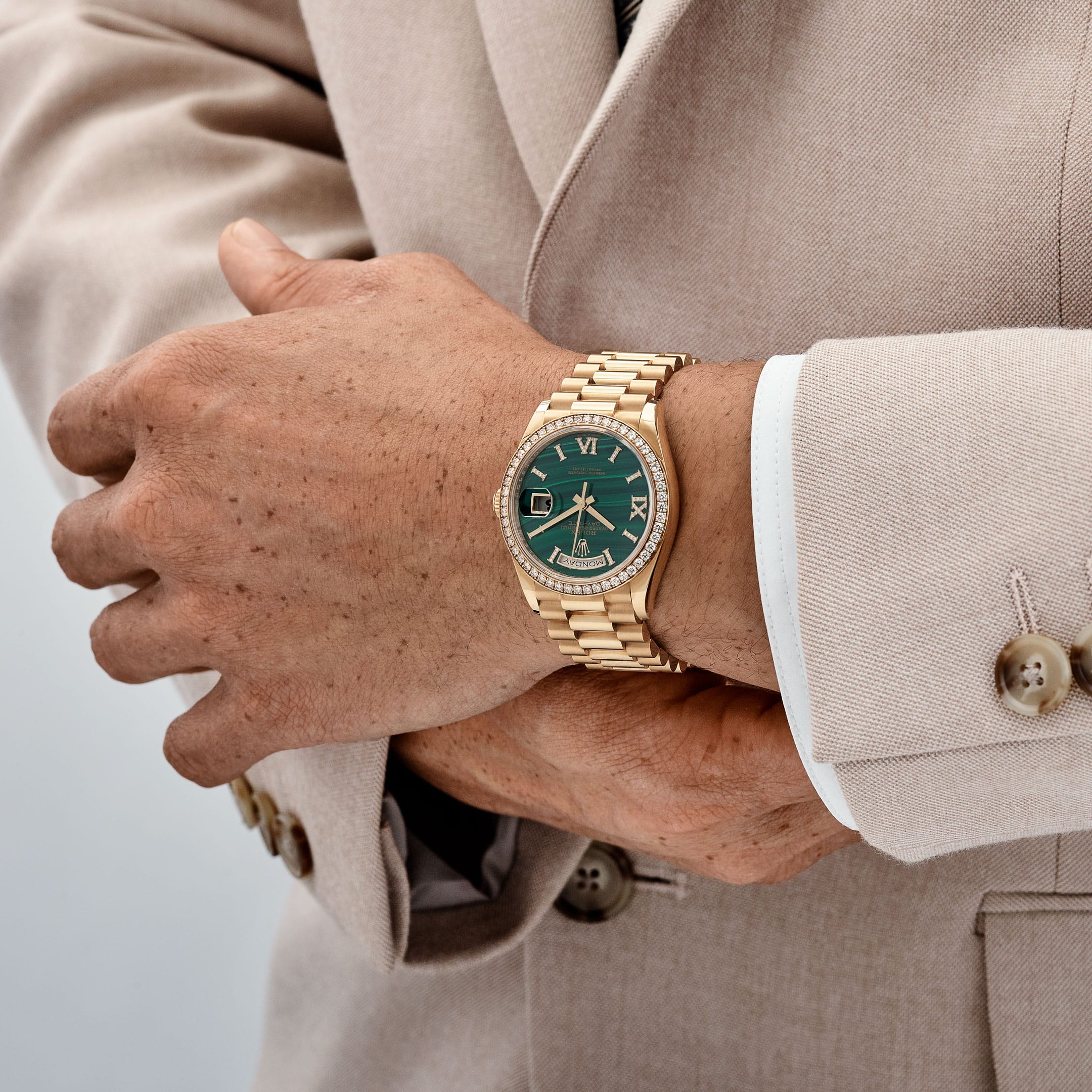 Rolex Day-Date 36 128348RBR Yellow Gold Green Malachite Dial Diamond Bezel (2021)