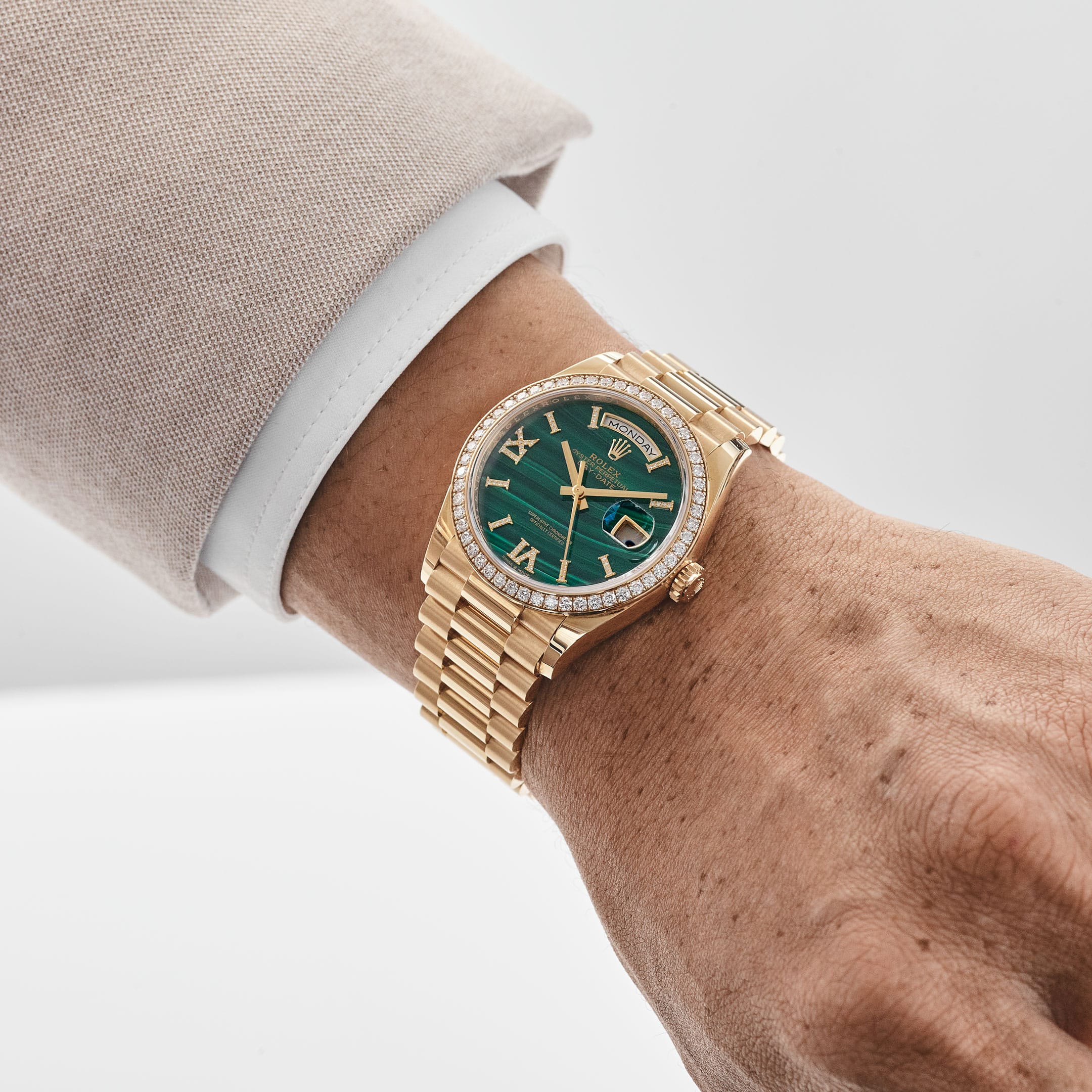 Rolex Day-Date 36 128348RBR Yellow Gold Green Malachite Dial Diamond Bezel (2021)
