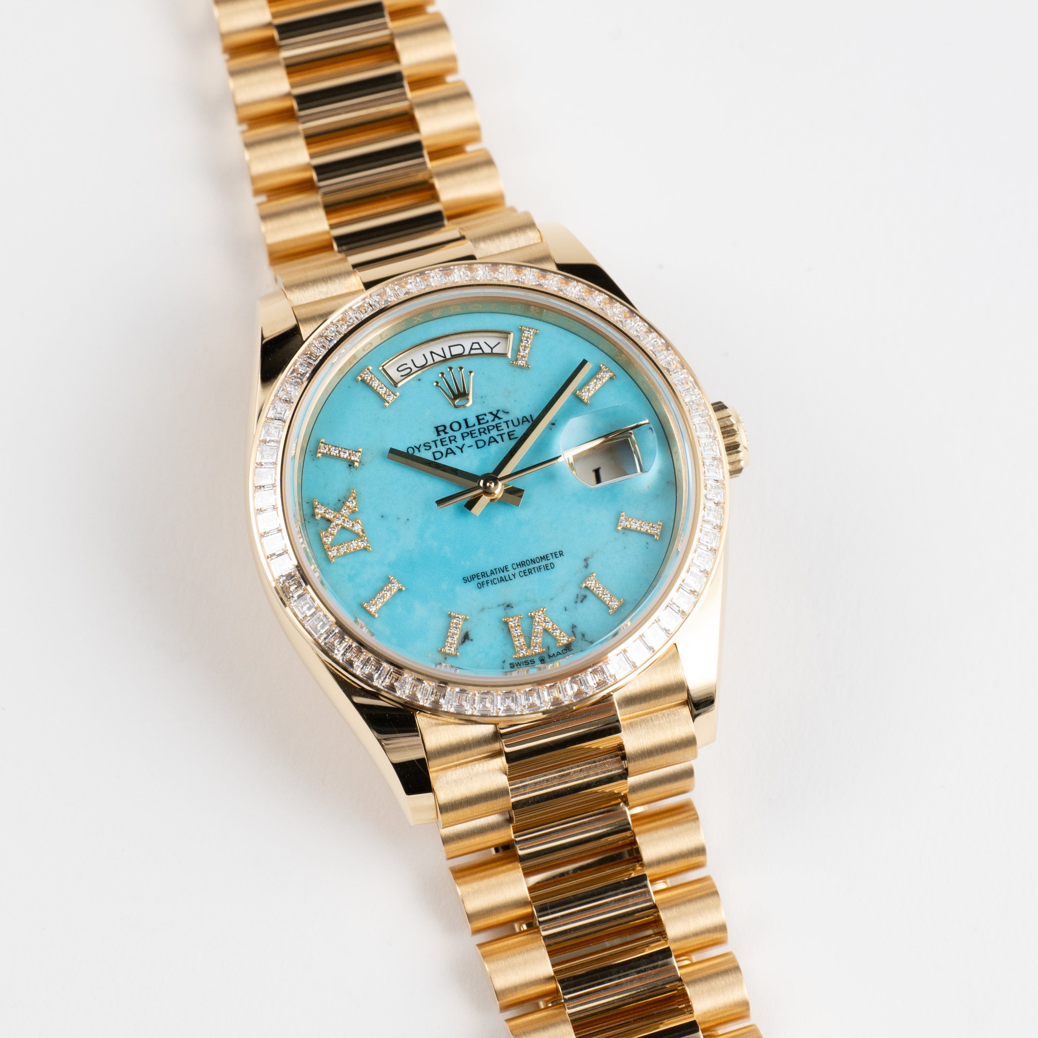 Rolex Day-Date 36 128398TBR Yellow Gold Turquoise Stone Diamond Roman Numerals Dial Diamond Bezel