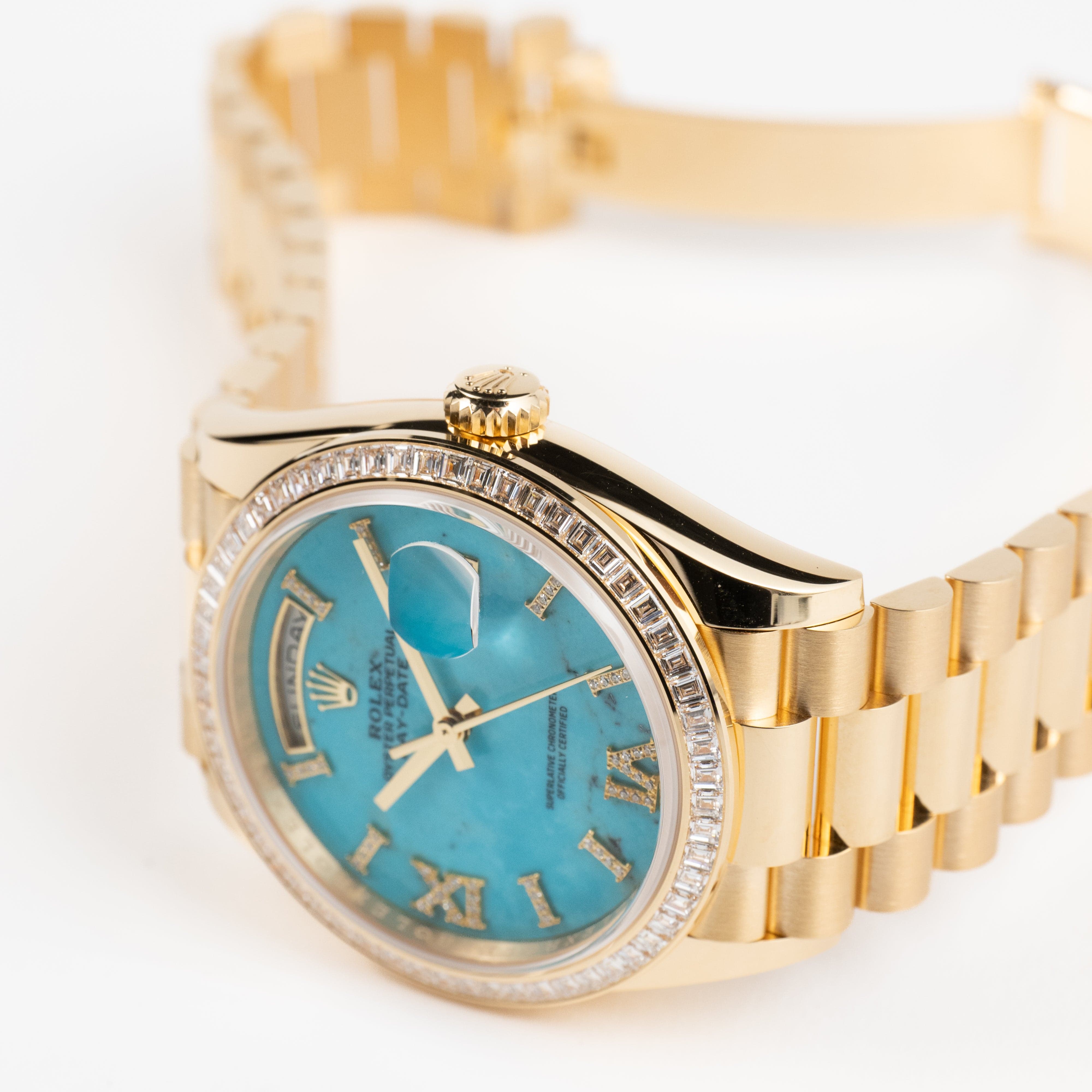 Rolex Day-Date 36 128398TBR Yellow Gold Turquoise Stone Diamond Roman Numerals Dial Diamond Bezel