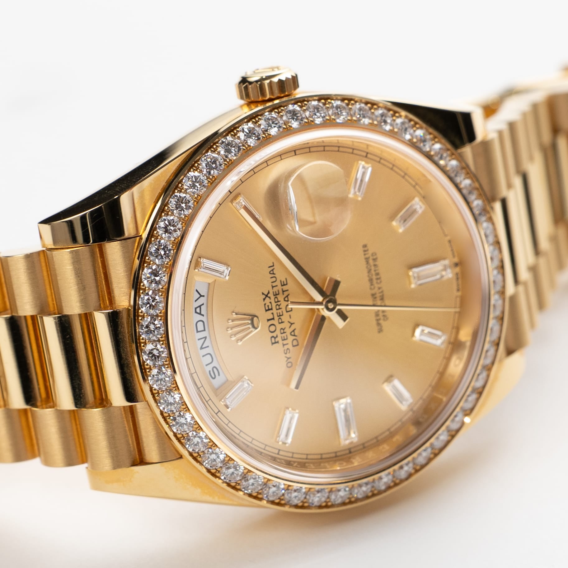 Rolex Day-Date 40 228348RBR Yellow Gold Champagne Diamond Baguette Dial Diamond Bezel (2021)