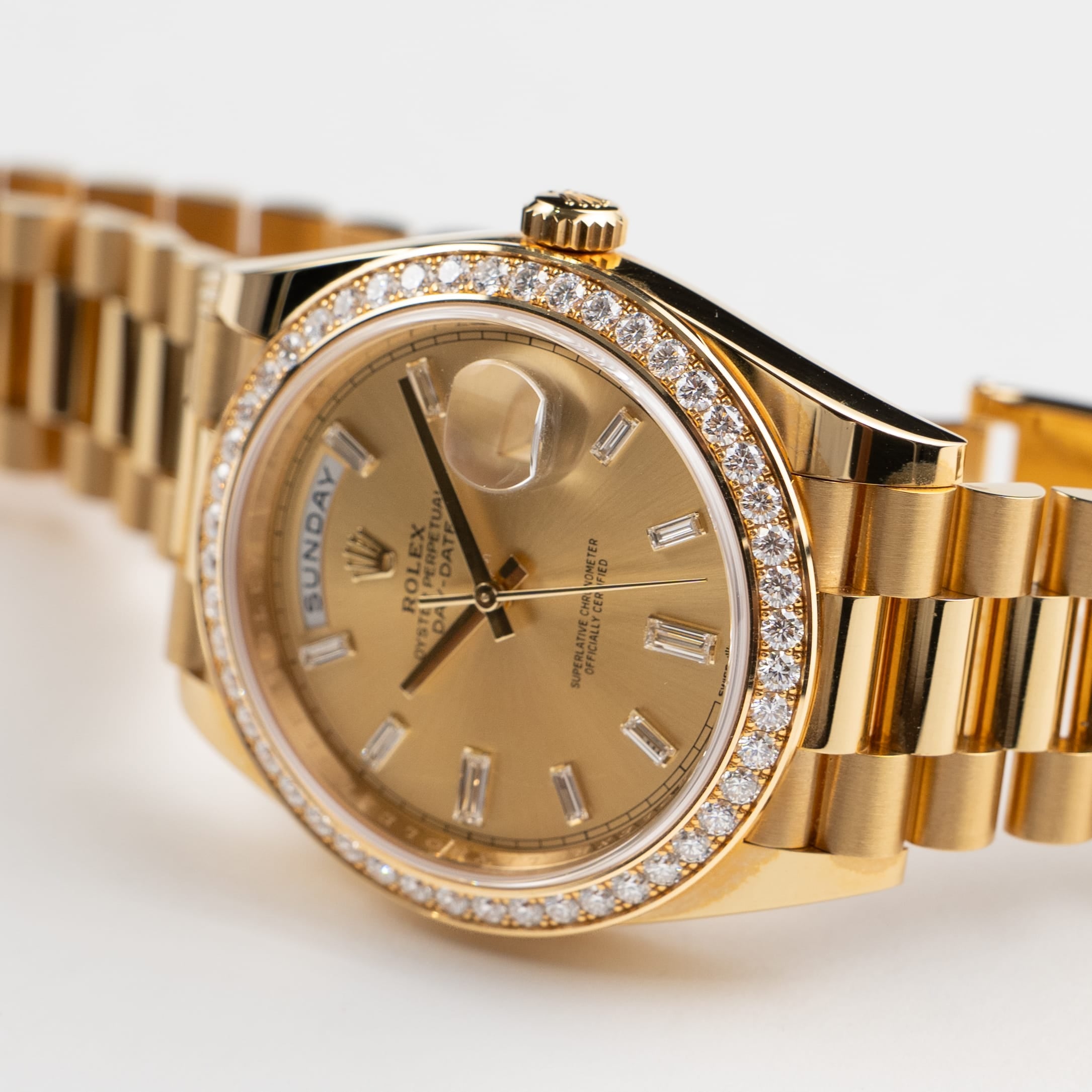 Rolex Day-Date 40 228348RBR Yellow Gold Champagne Diamond Baguette Dial Diamond Bezel (2021)