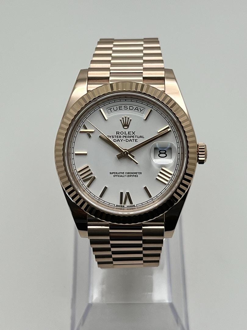 Luxury Watch Rolex Day-Date 40 Rose Gold White Roman Dial 228235 Wrist Aficionado