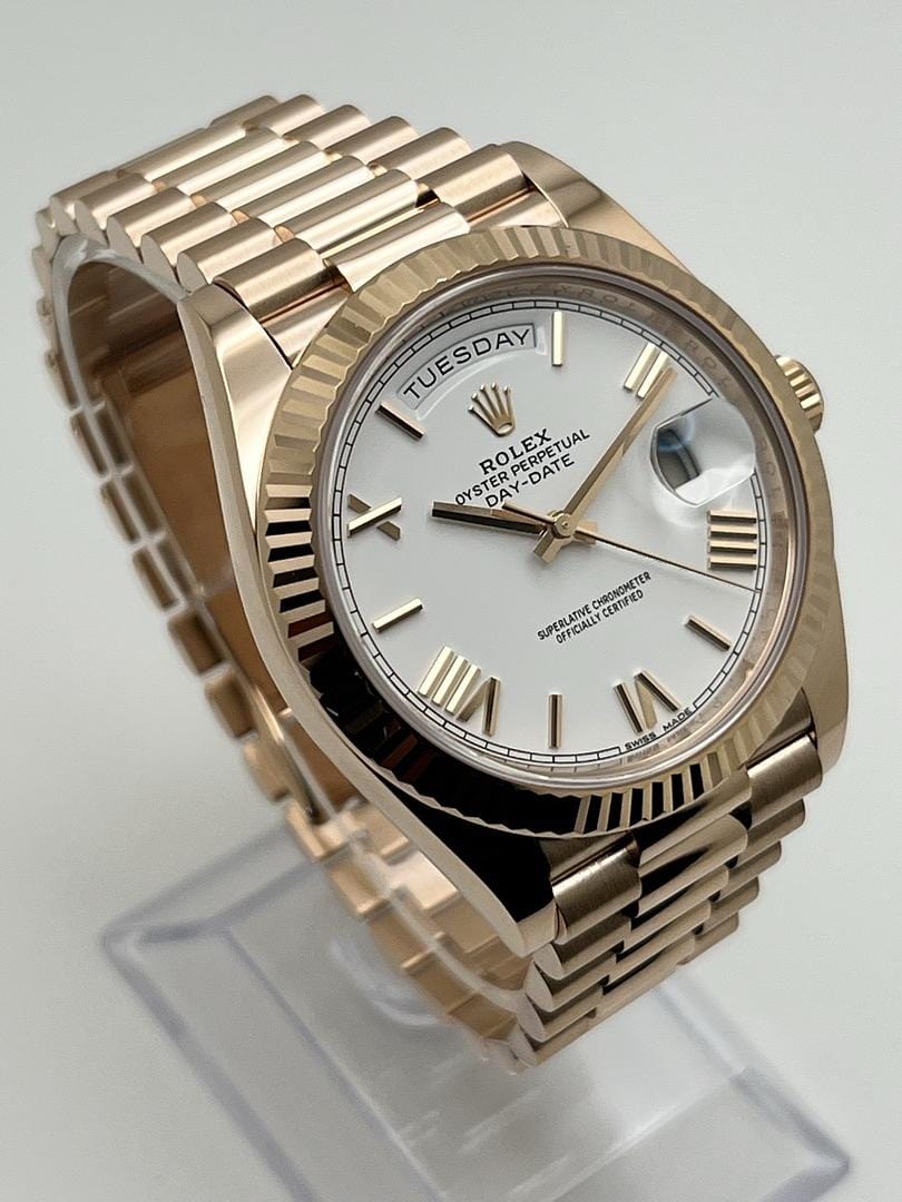 Luxury Watch Rolex Day-Date 40 Rose Gold White Roman Dial 228235 Wrist Aficionado