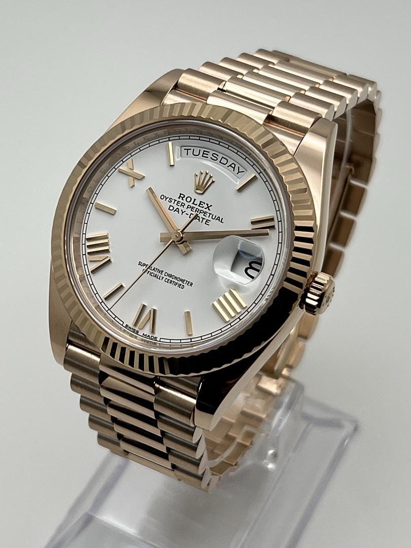 Luxury Watch Rolex Day-Date 40 Rose Gold White Roman Dial 228235 Wrist Aficionado