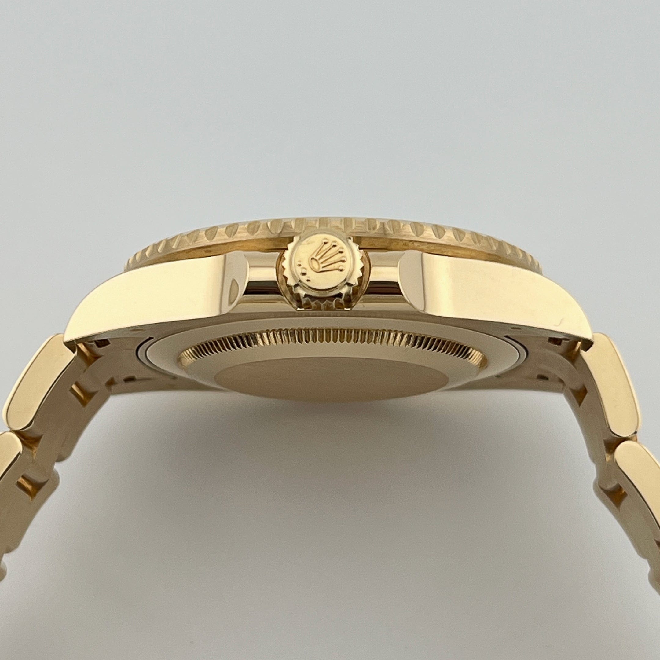 Rolex GMT-Master II 116718LN Yellow Gold Green Dial Black Bezel