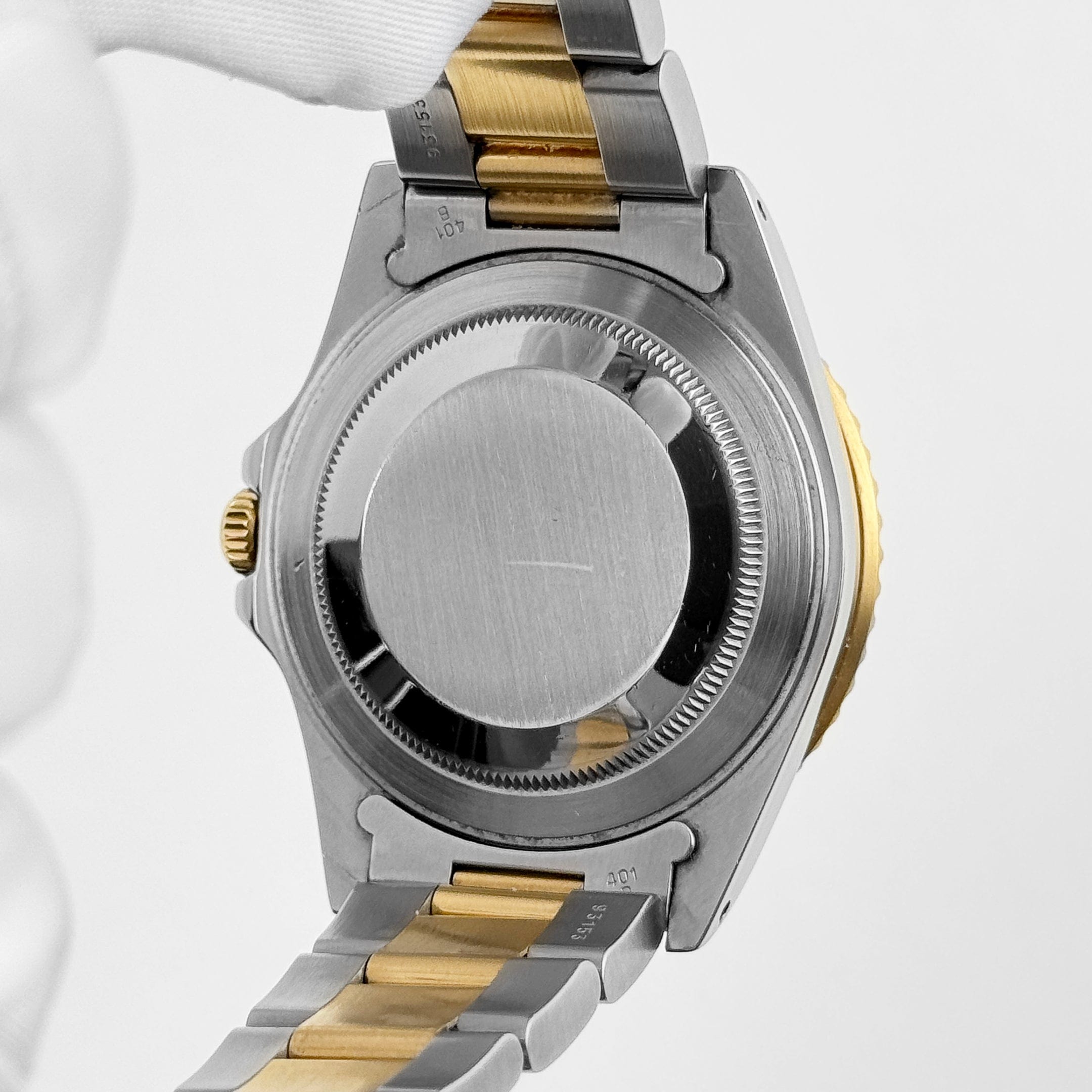 Rolex GMT-Master II 16713 Stainless Steel Yellow Gold Black Dial (1997)