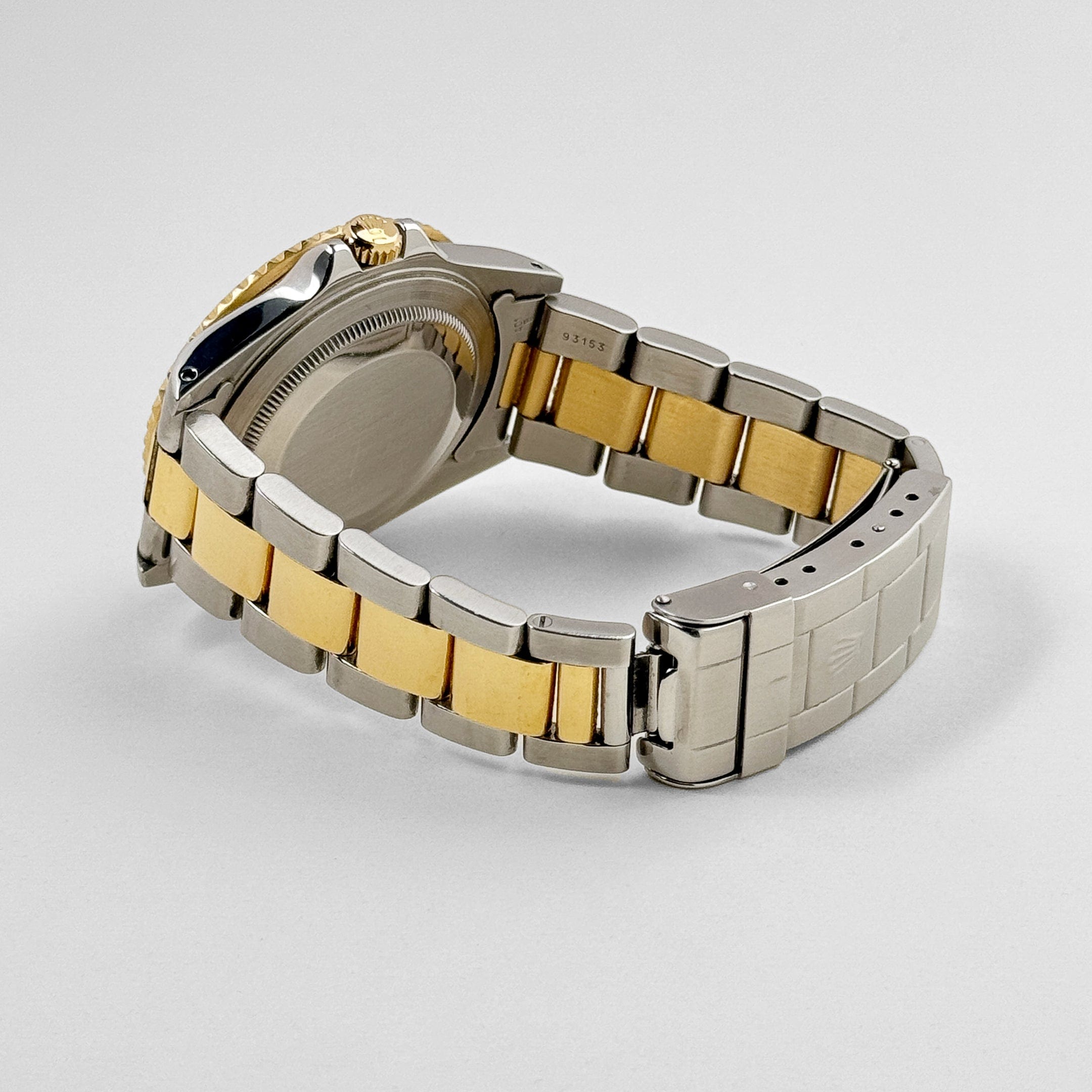 Rolex GMT-Master II 16713 Stainless Steel Yellow Gold Black Dial (1997)