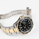 Rolex GMT-Master II 16713 Stainless Steel Yellow Gold Black Dial (1997)