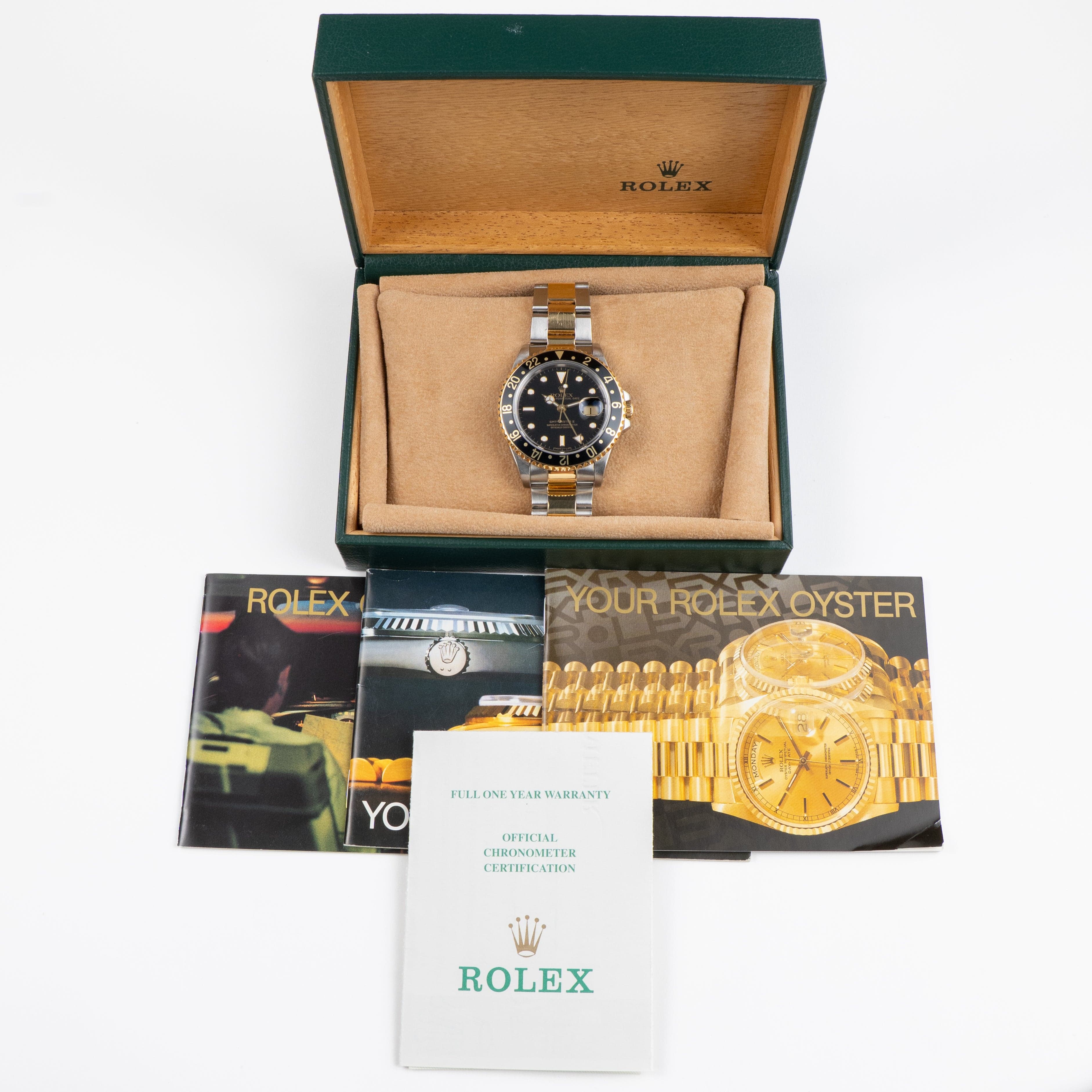 Rolex GMT-Master II 16713 Stainless Steel Yellow Gold Black Dial (1997)