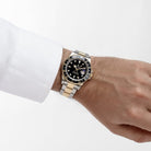 Rolex GMT-Master II 16713 Stainless Steel Yellow Gold Black Dial (1997)