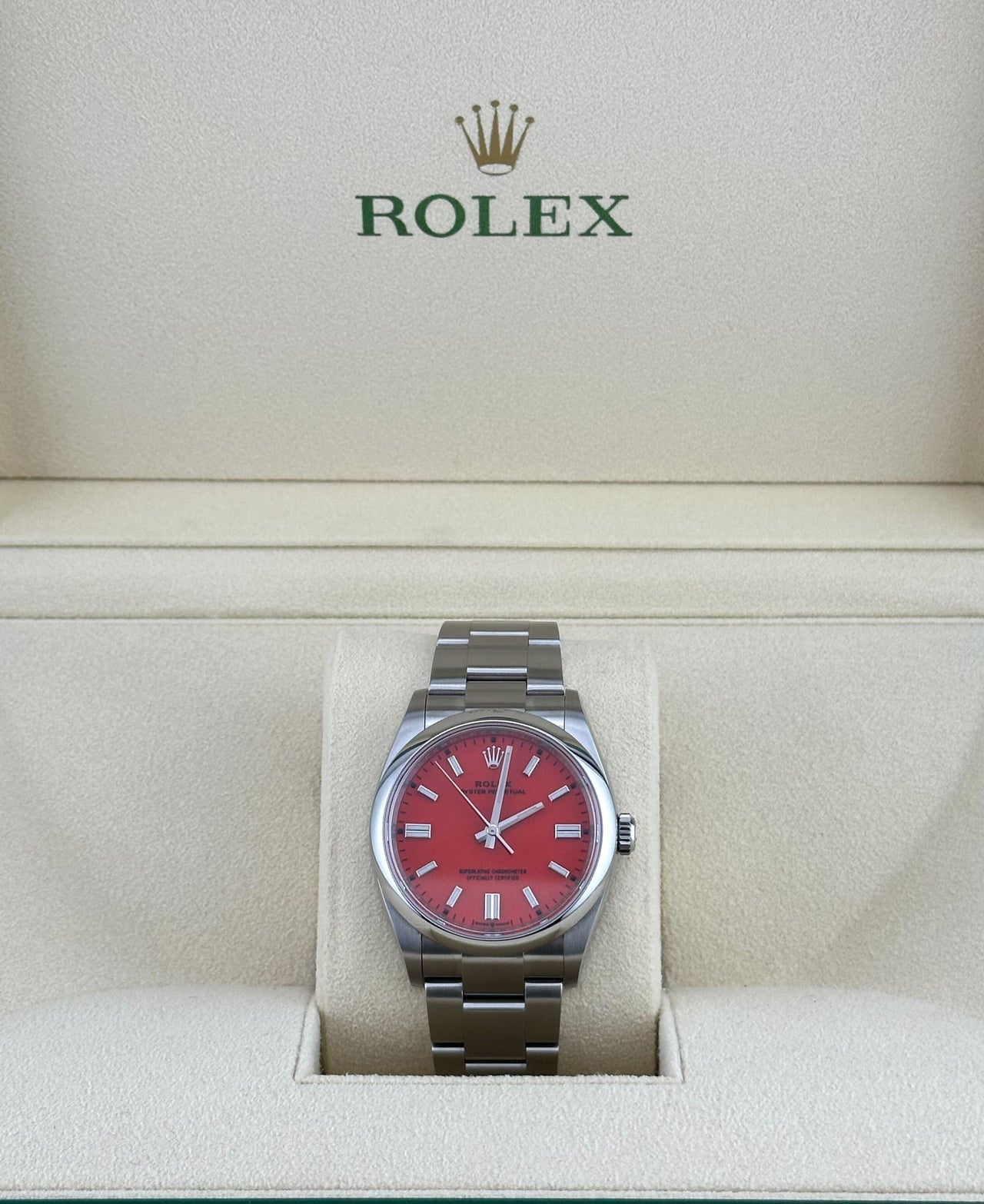 Rolex Oyster Perpetual 126000 Stainless Steel Coral Red Dial