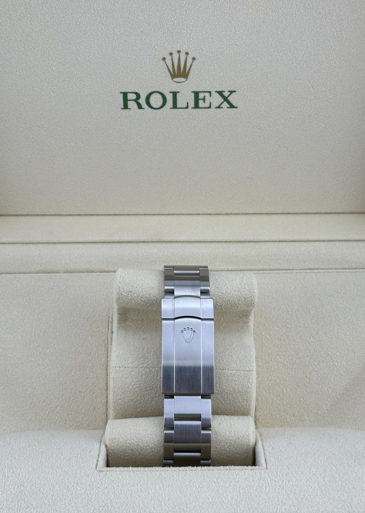 Rolex Oyster Perpetual 126000 Stainless Steel Coral Red Dial
