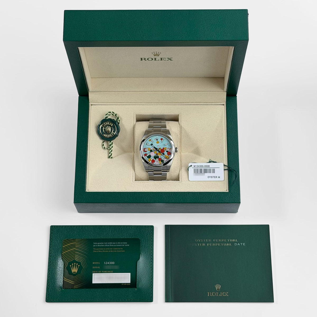 Rolex Oyster Perpetual 41 124300 Stainless Steel 'Celebration Motif' Dial (2024)