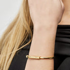 Tiffany & Co.  Lock Bangle in Yellow Gold with Diamond Accents Wrist Aficionado