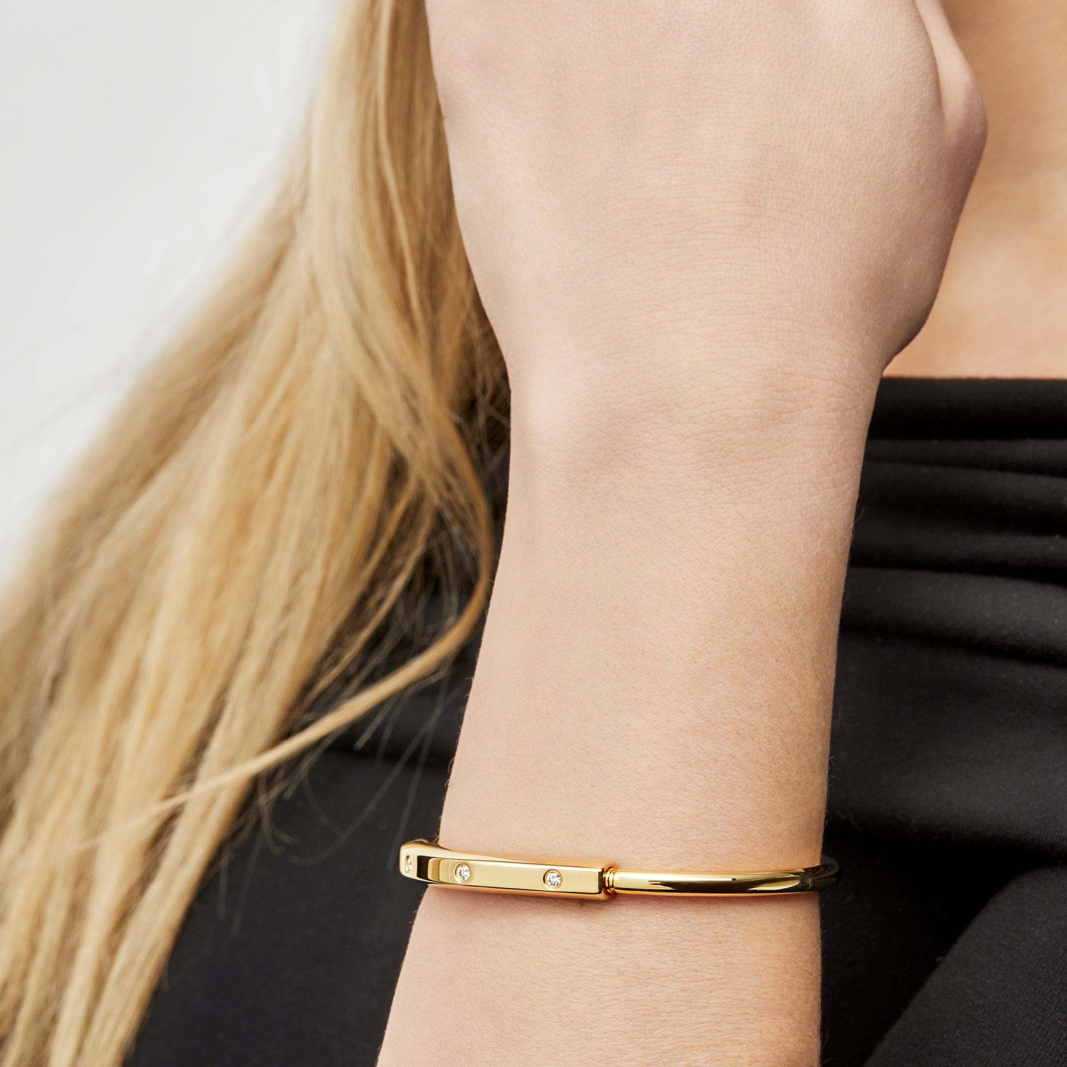 Tiffany & Co.  Lock Bangle in Yellow Gold with Diamond Accents Wrist Aficionado