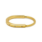 Tiffany & Co.  Lock Bangle in Yellow Gold with Diamond Accents Wrist Aficionado